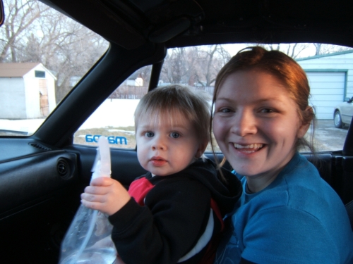 Markus loves to help clean Daddy's Mazda.