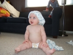 Wearing Markus' pj pants on his head.