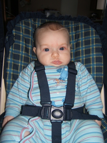 You wouldn't know it from his expression, but he loved swinging.