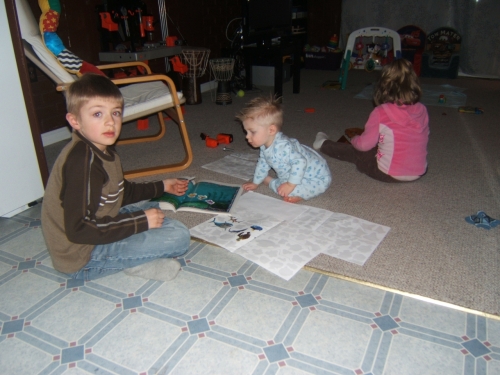 Checking out Noah's sticker book.
