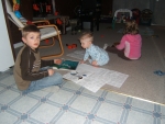 Checking out Noah's sticker book.